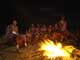 the staff at the campfire at night